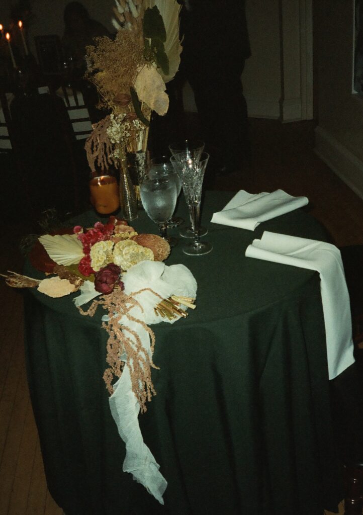 35mm film photo of the bride and groom's sweetheart table at their reception